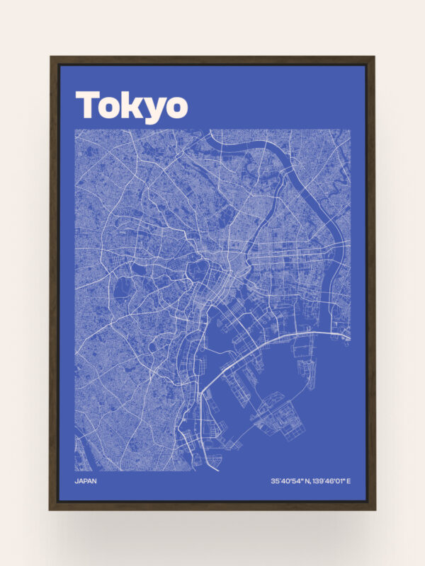 Tokio A framed map of Tokyo, Japan, featuring a blue background with white outlines of the city's layout and streets. The title 'Tokyo' is prominently displayed at the top, with geographic coordinates at the bottom.