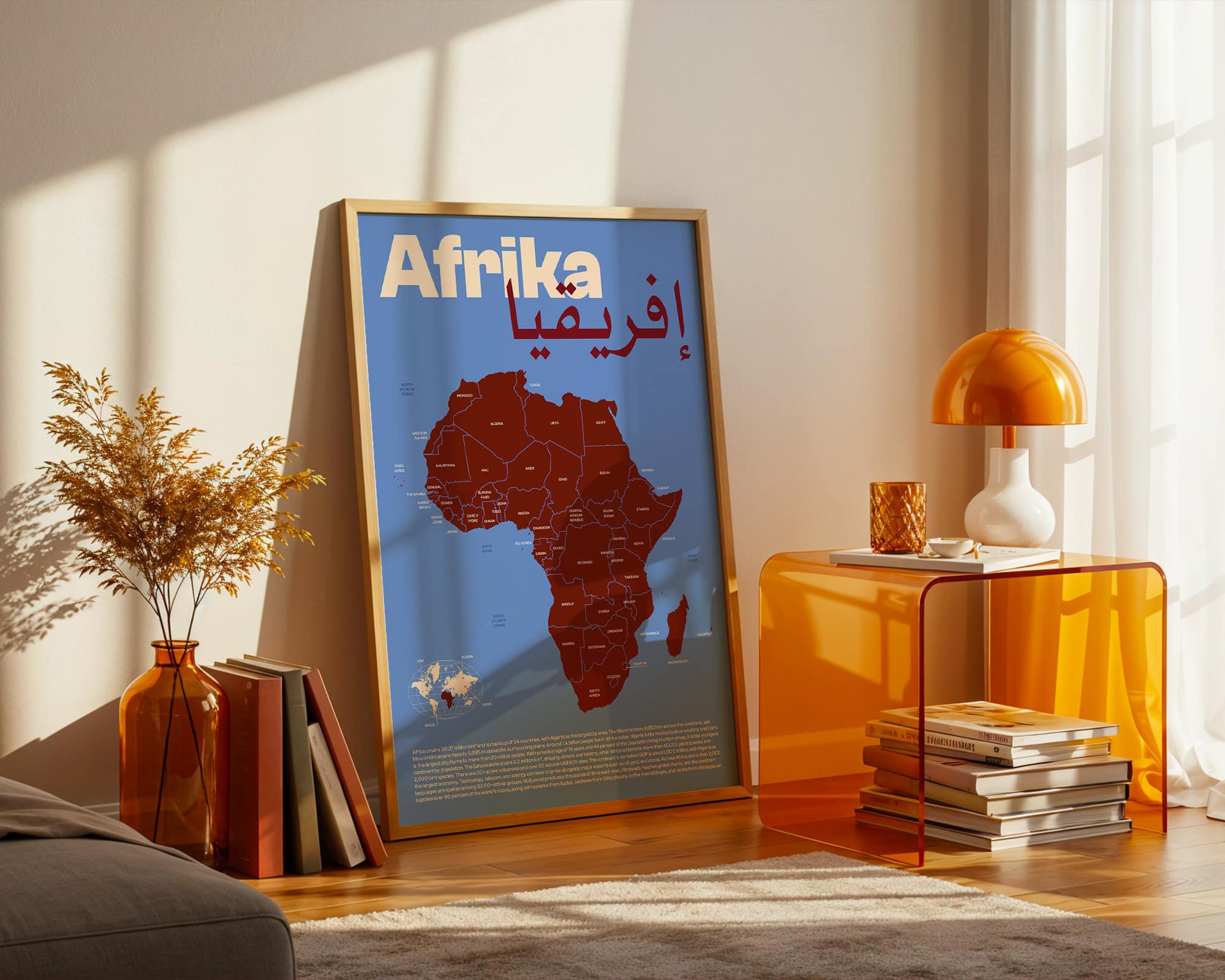 Framed Africa map print displayed in modern living room with orange decor