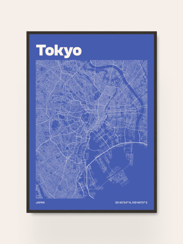 A minimalist map of Tokyo displayed in blue, featuring streets and geographic outlines. The city name "Tokyo" is prominently shown at the top in bold white letters. The bottom includes the word "JAPAN" and coordinates in smaller text.